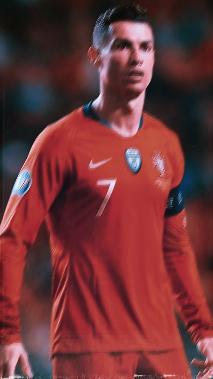 Cristiano Ronaldo looking to the left in a Portugal jersey - Cristiano Ronaldo