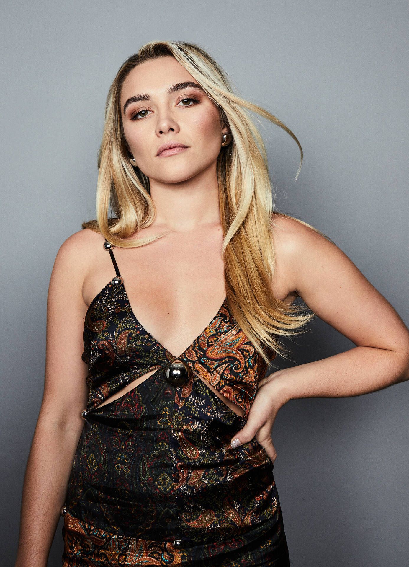 Download Florence Pugh striking a pose at The Wrap event Wallpaper
