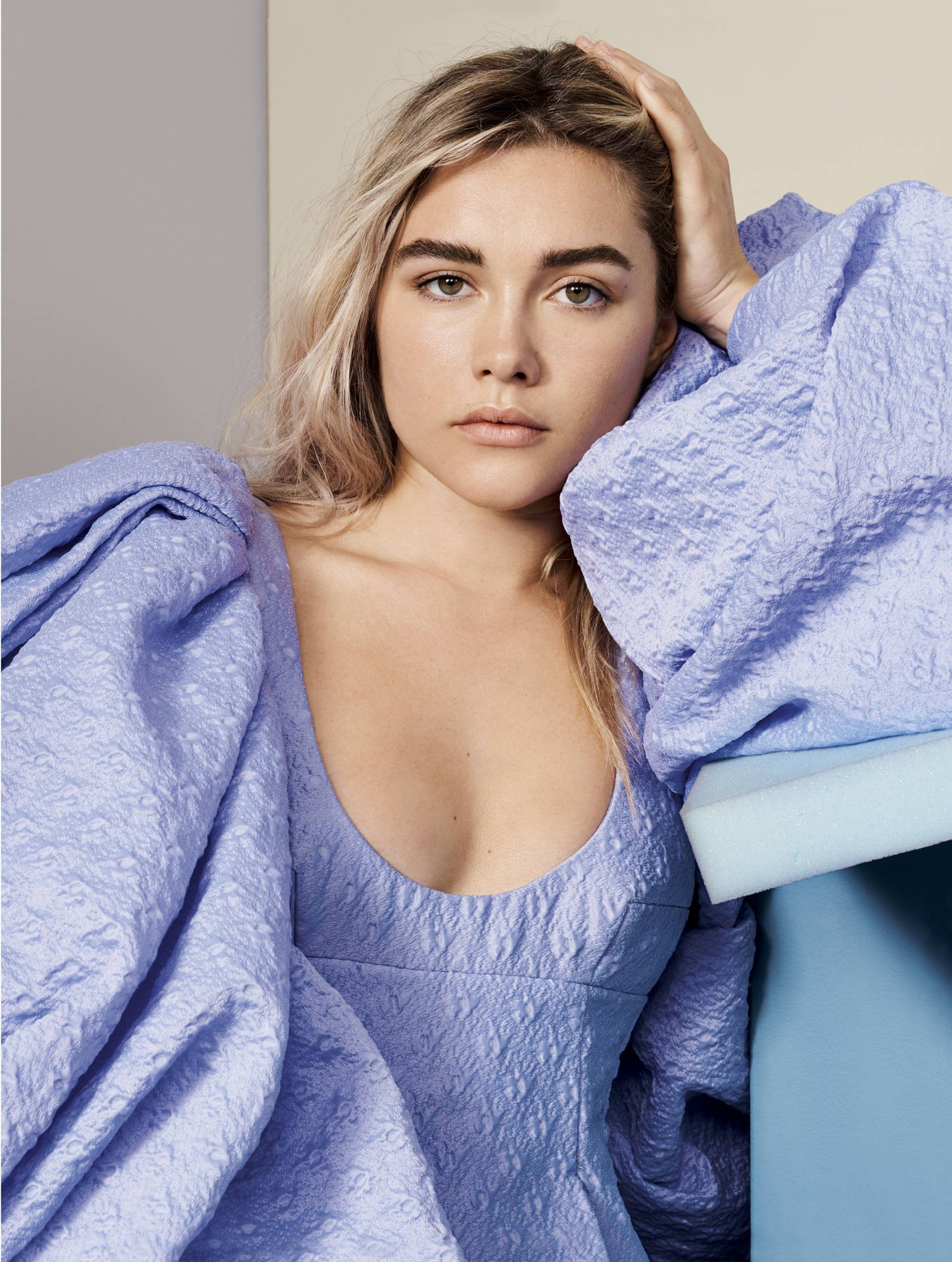 Florence Pugh wearing a blue dress and resting her head on her hand - Florence Pugh
