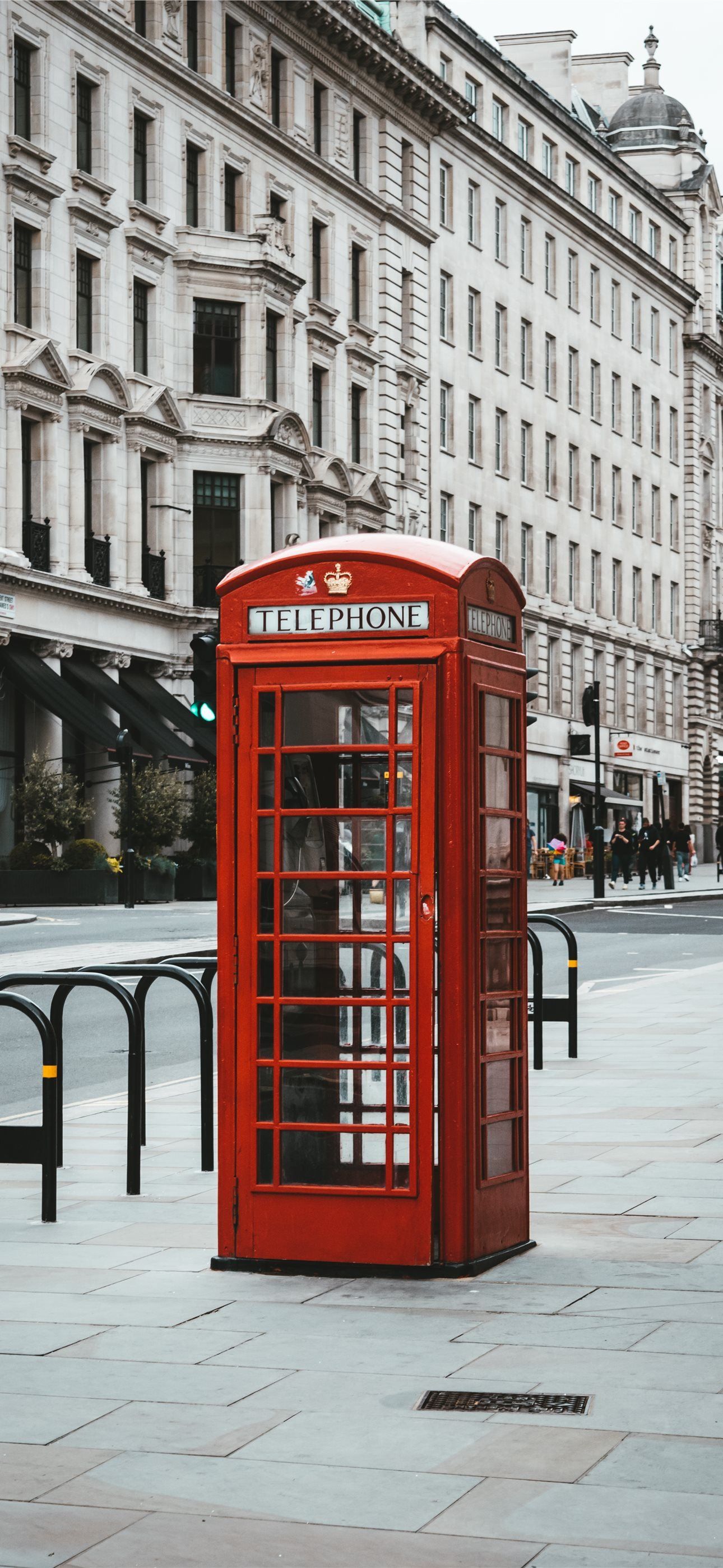 red telephone booth near white concrete building d. iPhone Wallpaper Free Download
