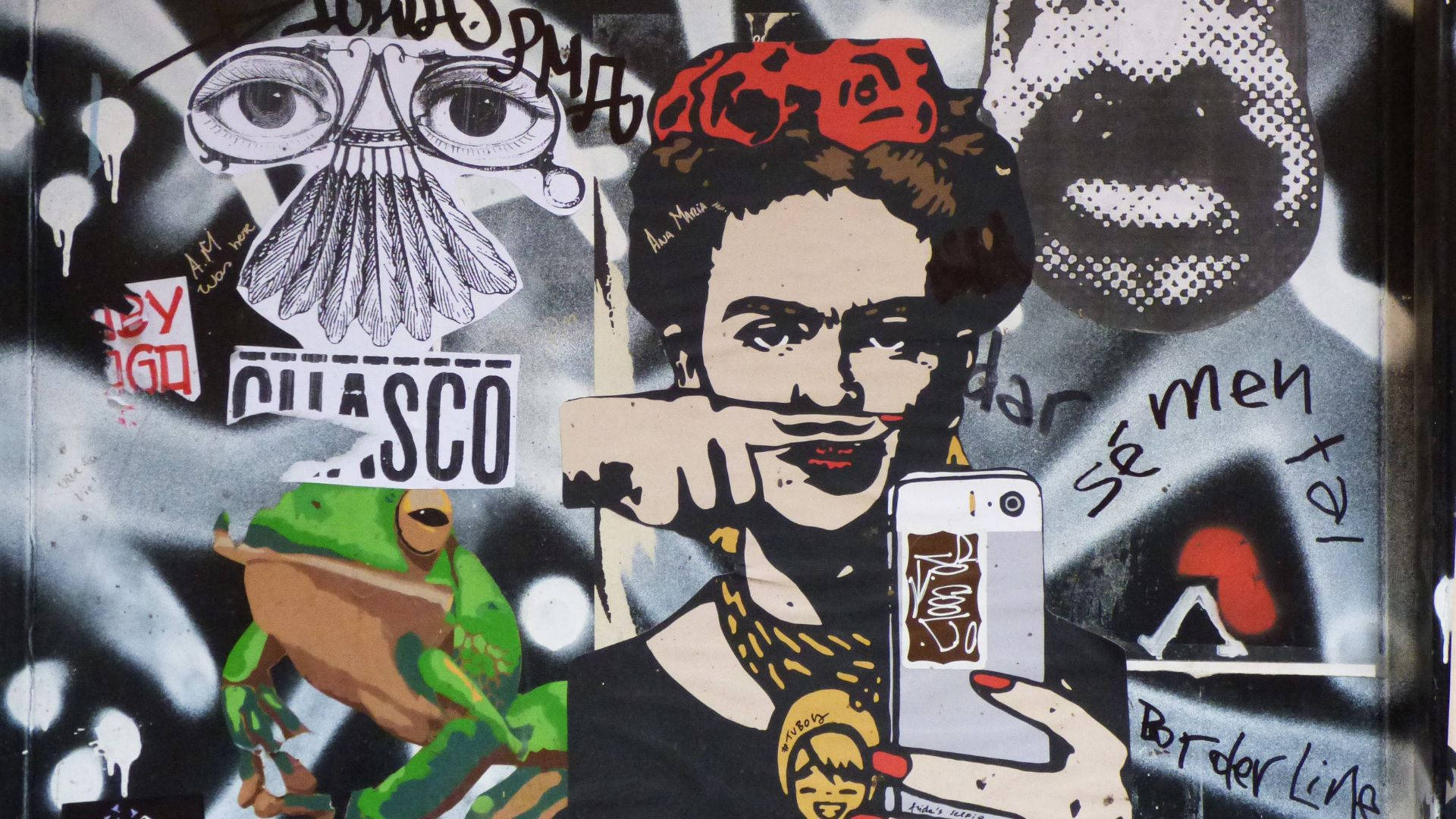 A sticker of Frida Kahlo holding a phone. - Frida Kahlo