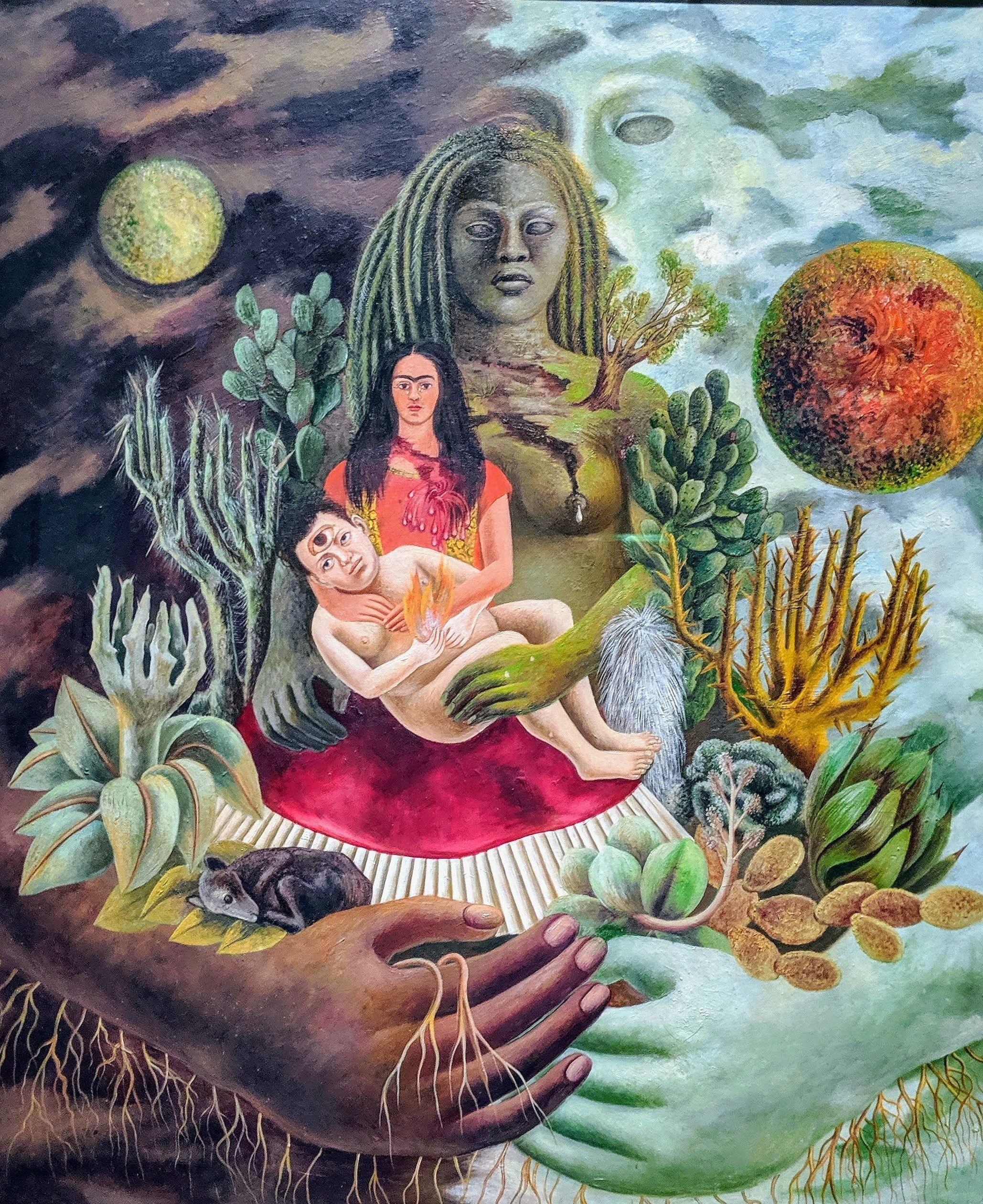 A painting of a woman holding a baby, with a figure of a face in the clouds and a moon in the sky. - Frida Kahlo