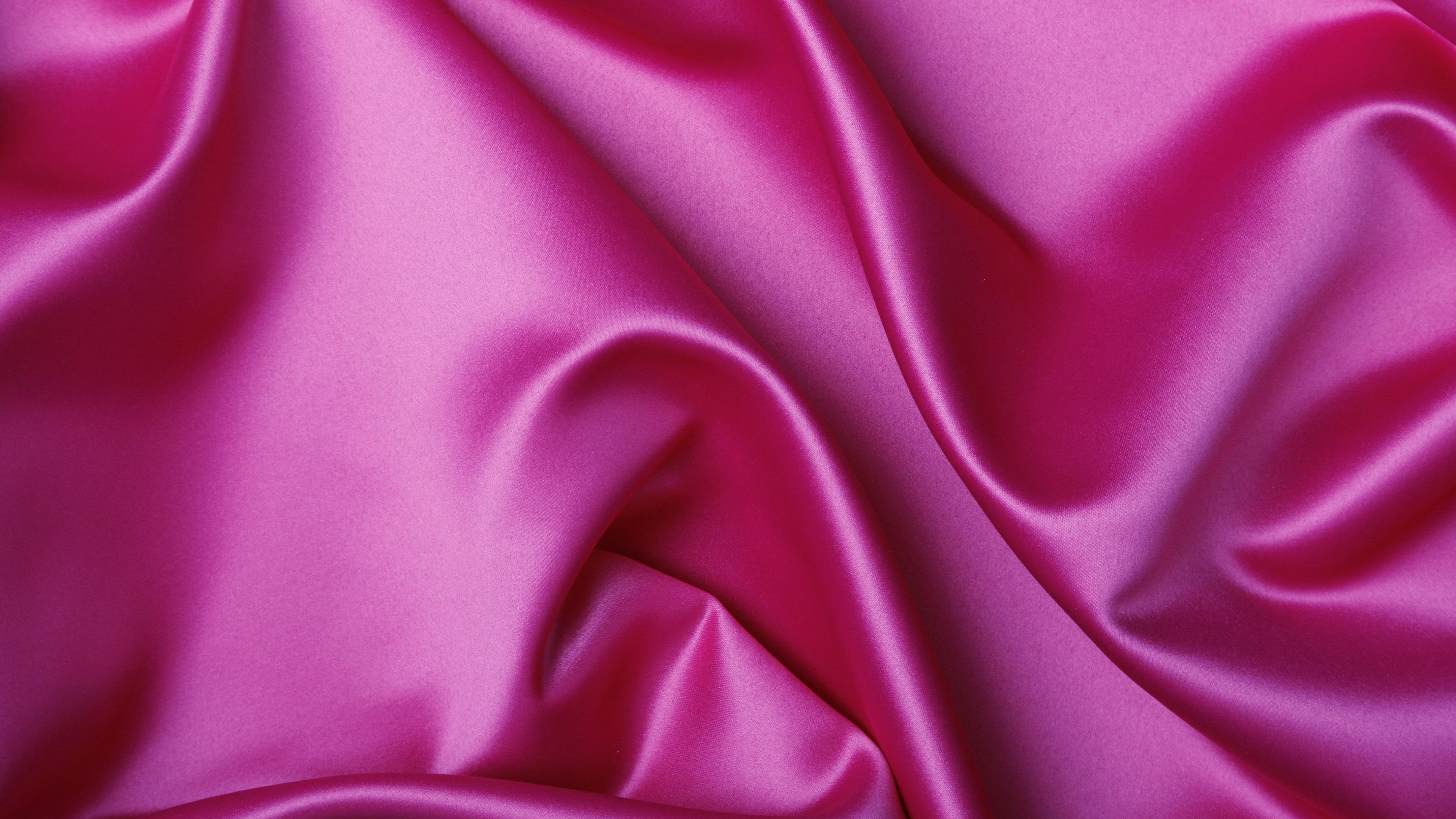 A pink silk background with some light and shadow - Silk