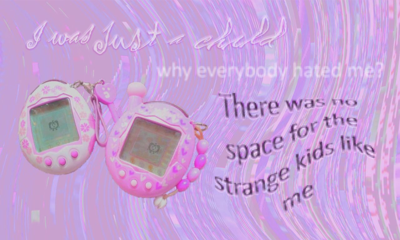 A pink tamagotchi with the words 