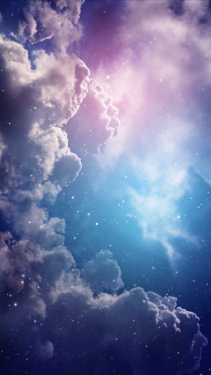 A blue and purple sky with white clouds and stars - Galaxy