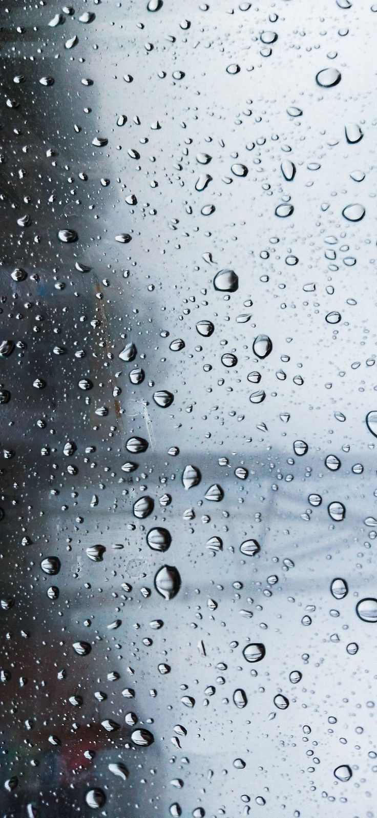 Raindrops on a window pane - Rain