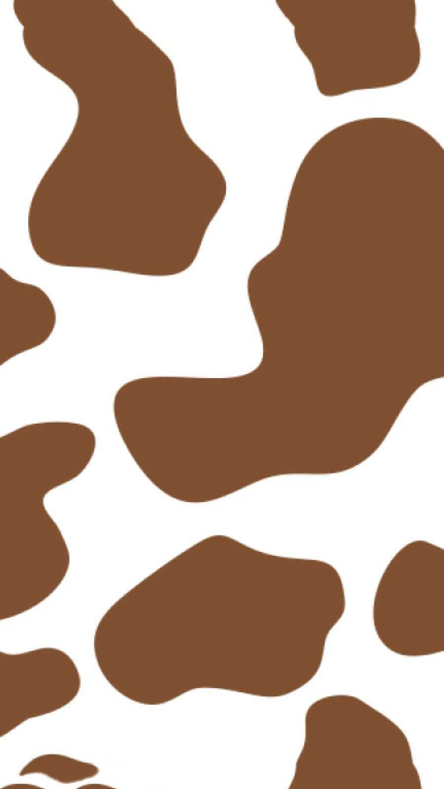 A brown and white cow pattern - Cow