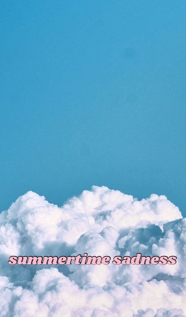 Aesthetic wallpaper of a blue sky with white clouds and the words 