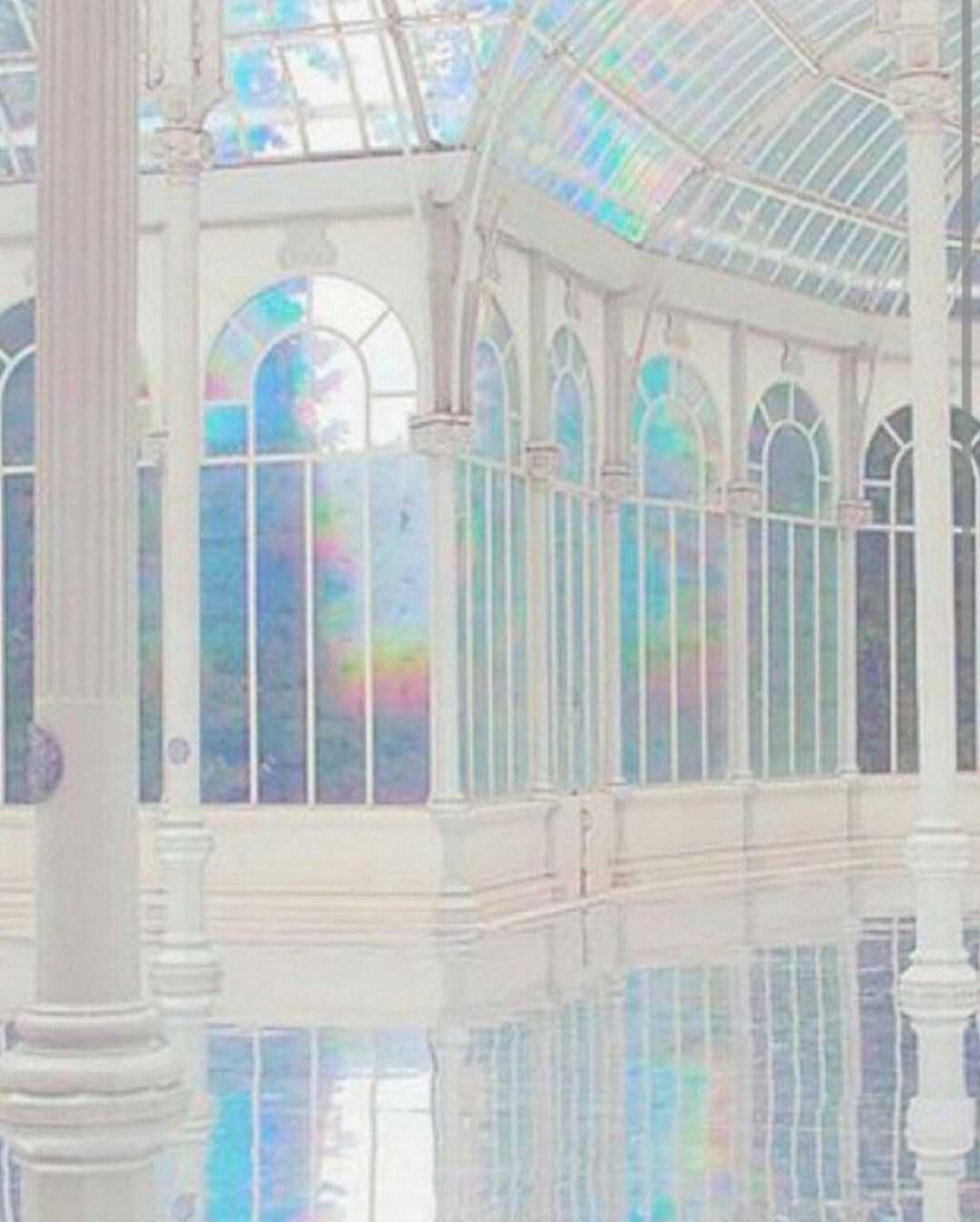 A greenhouse with rainbow light shining through the windows - Holographic