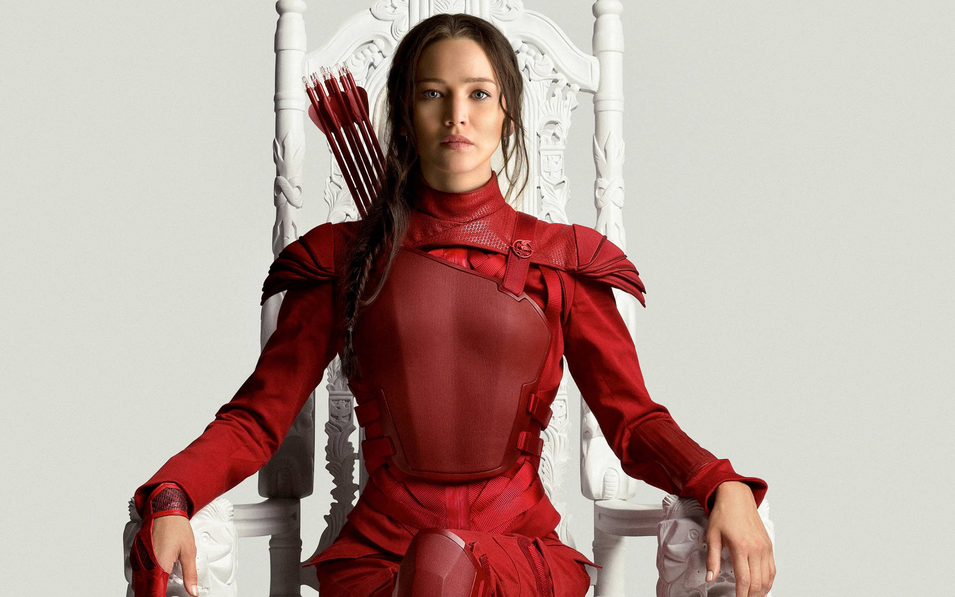 Katniss Everdeen sitting on a white throne with an arrow through her chest - Jennifer Lawrence