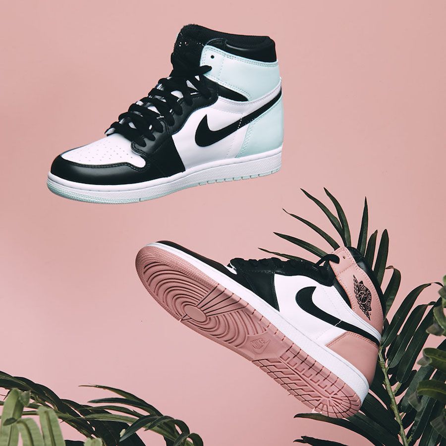 A pair of black and pink Nike sneakers - Air Jordan