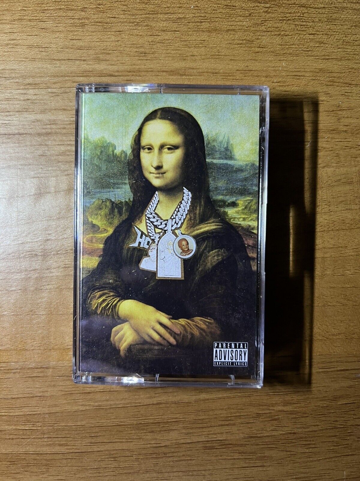 Cassette tape of a rap song with a picture of Mona Lisa wearing a chain - Mona Lisa