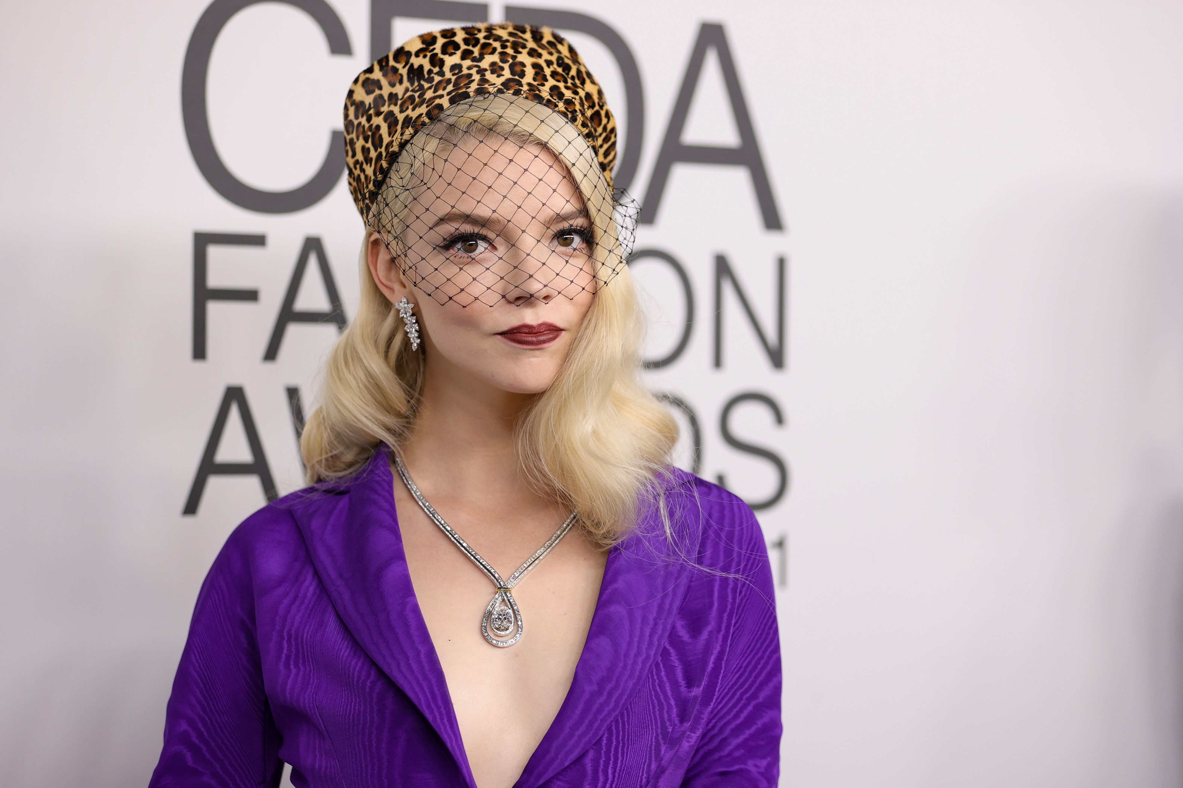 Anya Taylor-Joy wears a purple dress and a leopard print hat at the 2021 CFDA Awards - Anya Taylor-Joy