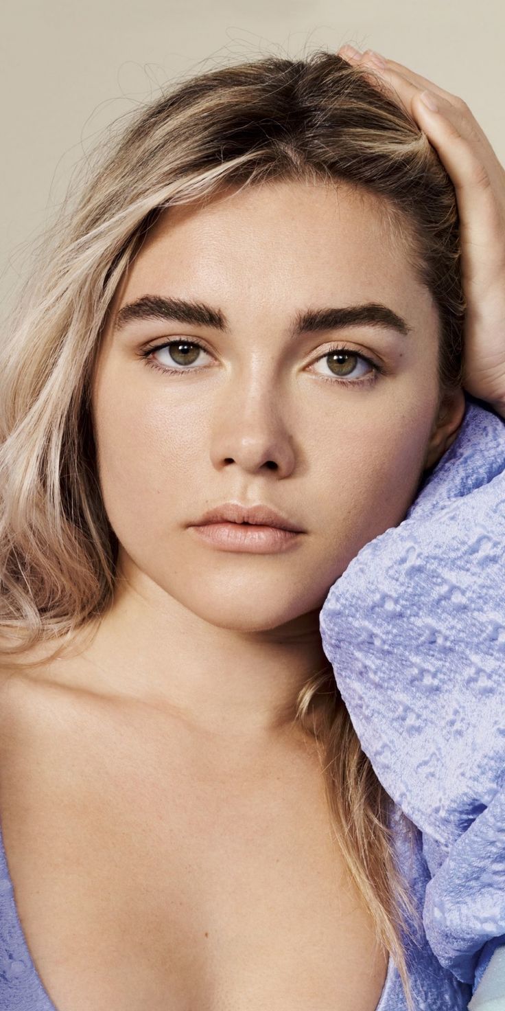 Florence Pugh in a purple top with her hair half up - Florence Pugh