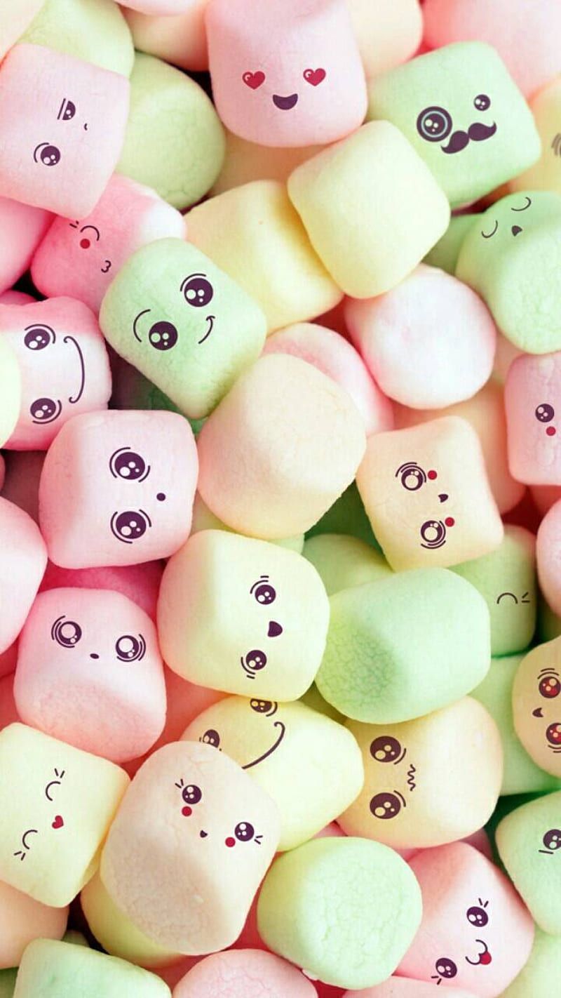 A pile of marshmallows with cute faces drawn on them - Marshmallows