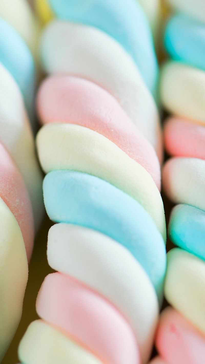 A close up of a pile of colorful marshmallows. - Marshmallows
