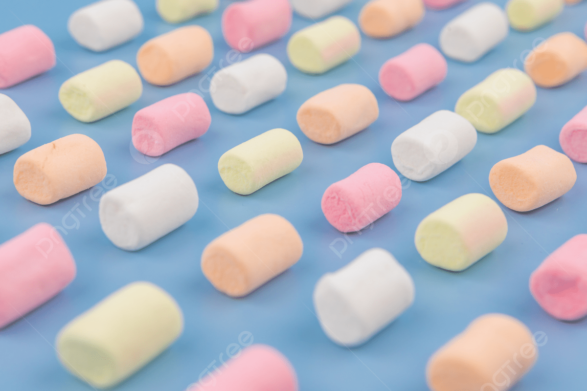 A blue background with many colorful marshmallows - Marshmallows