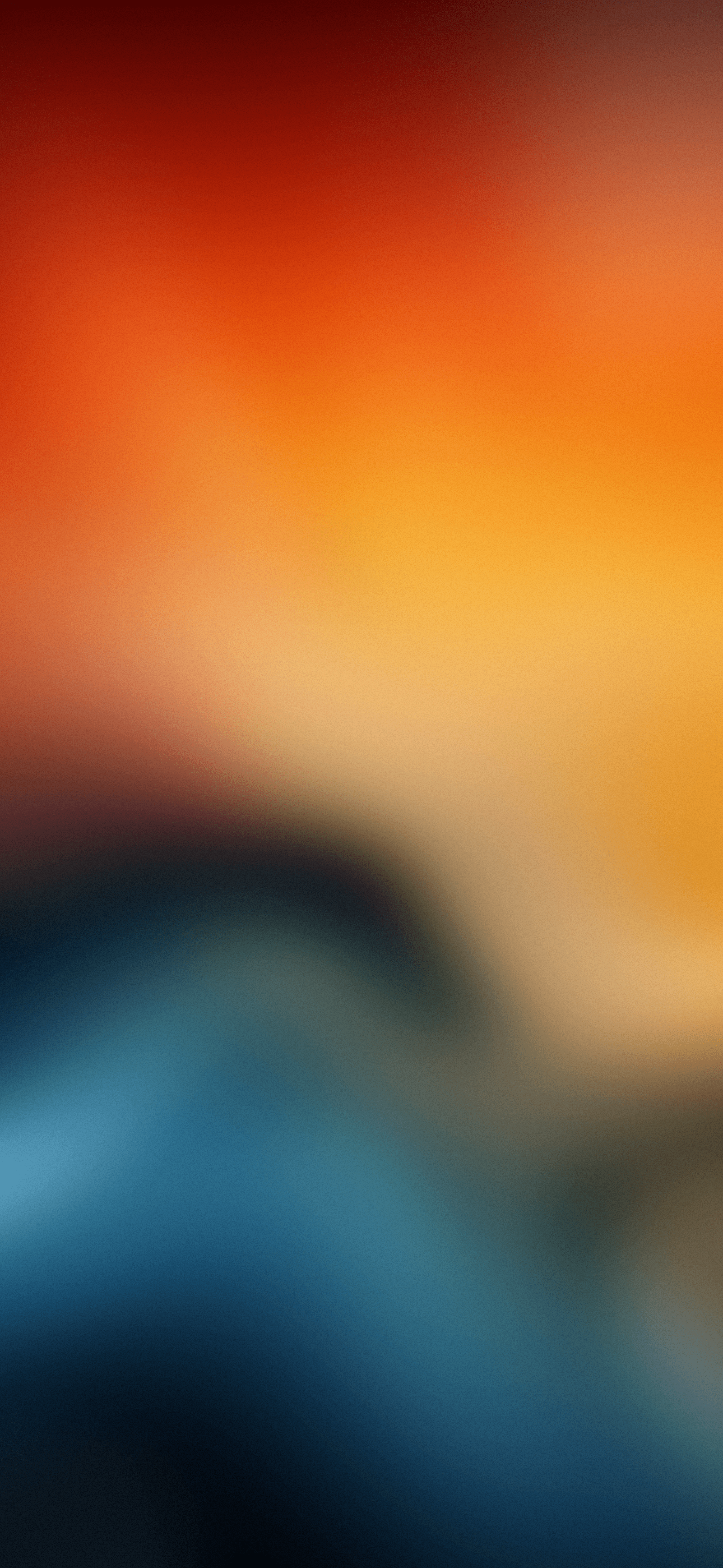 A blurry image of a sunset with hues of orange, blue, and yellow. - Gradient