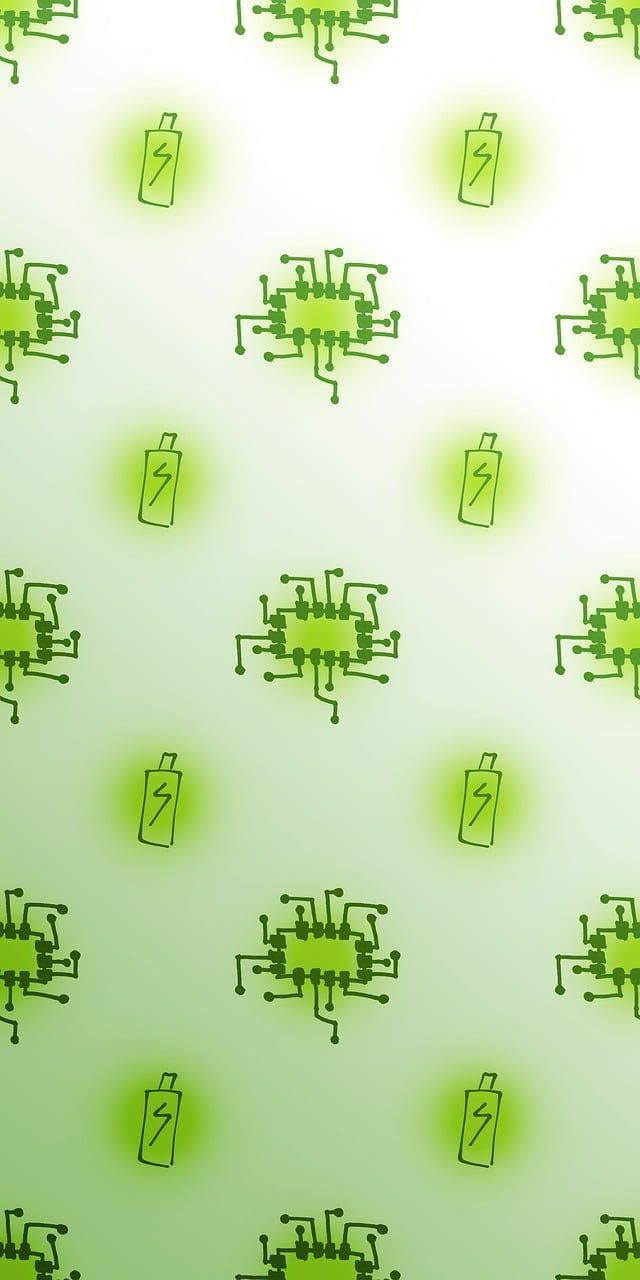 A pattern of green circuit boards on a white background - Battery