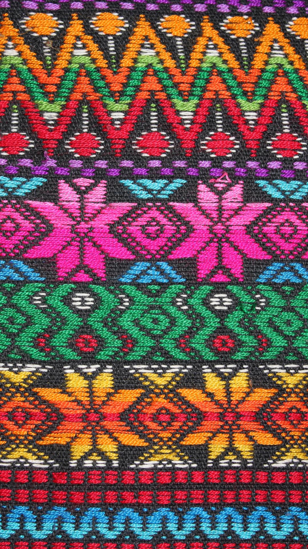 An image of a colorful fabric with a zigzag pattern. - Indie