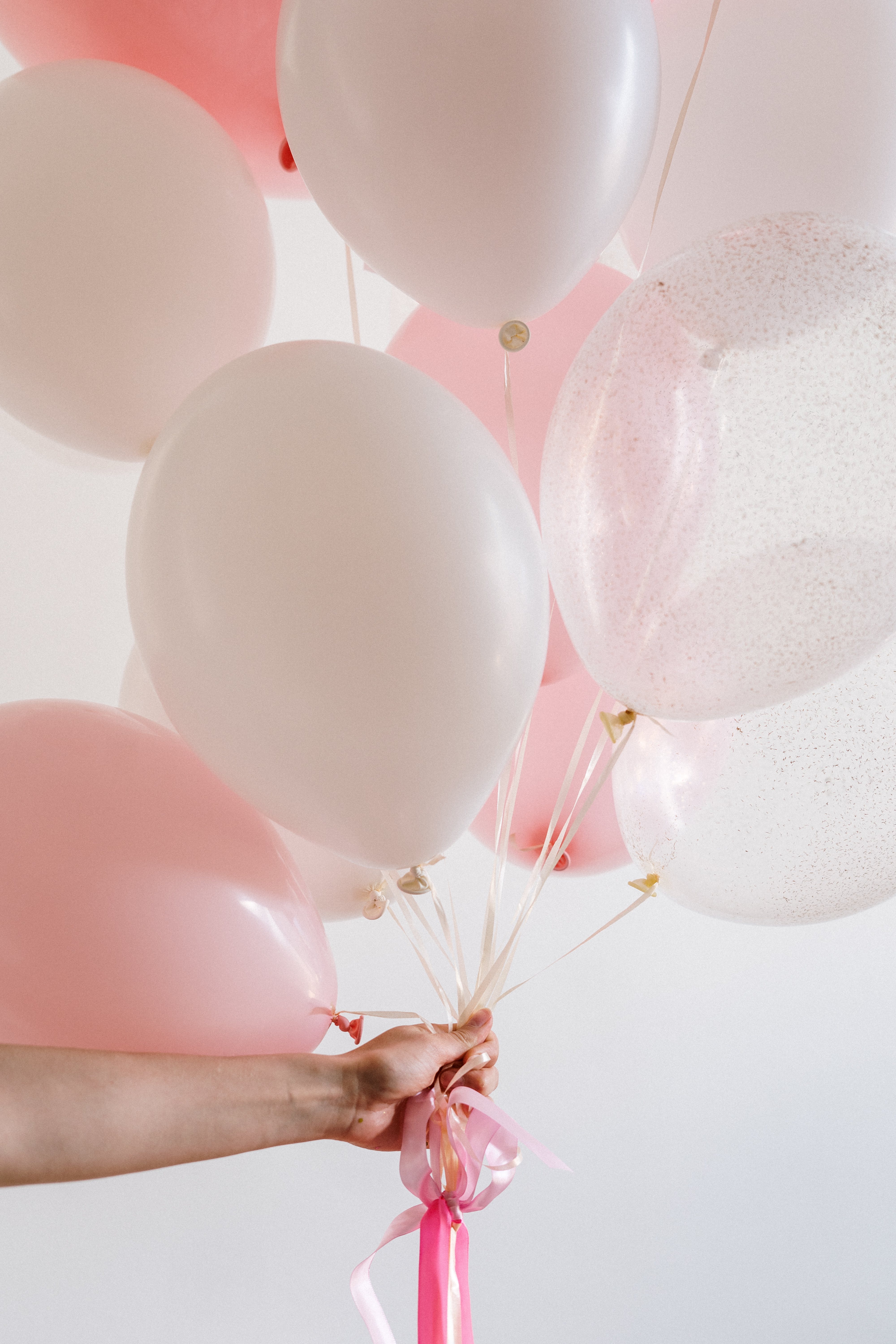 Bouquet of Pink Balloons held