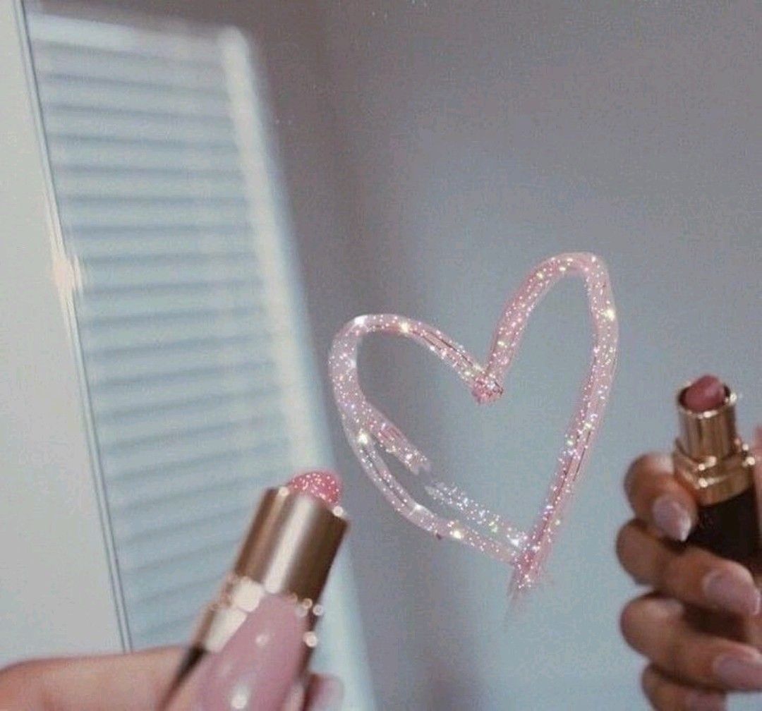 Aesthetic lipstick heart on mirror