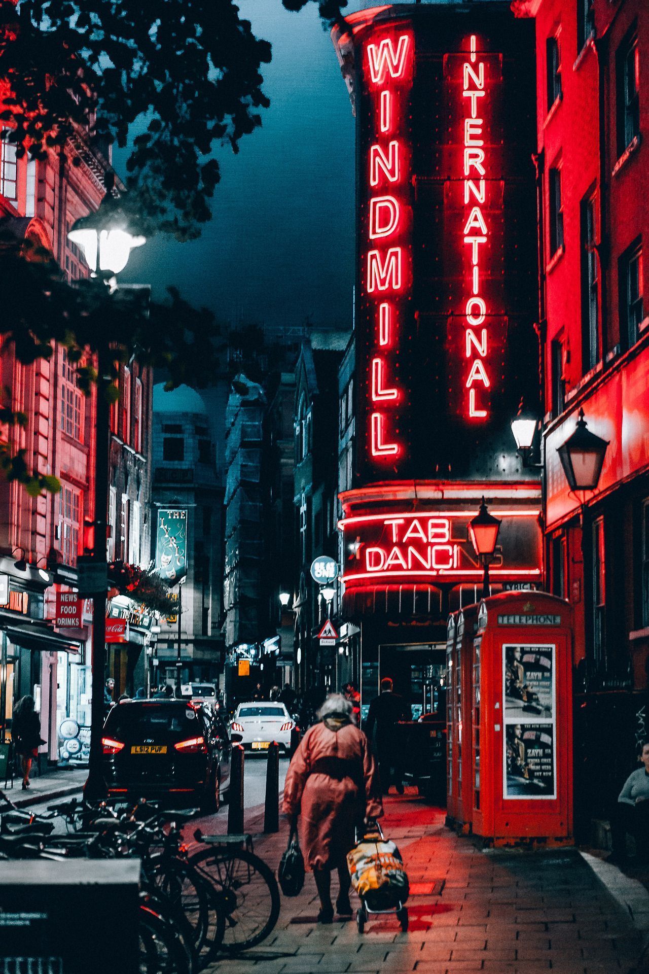 A woman is walking down the street - City, anime city, retro, neon red