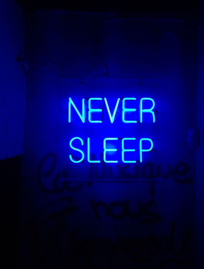 A blue neon sign that says 