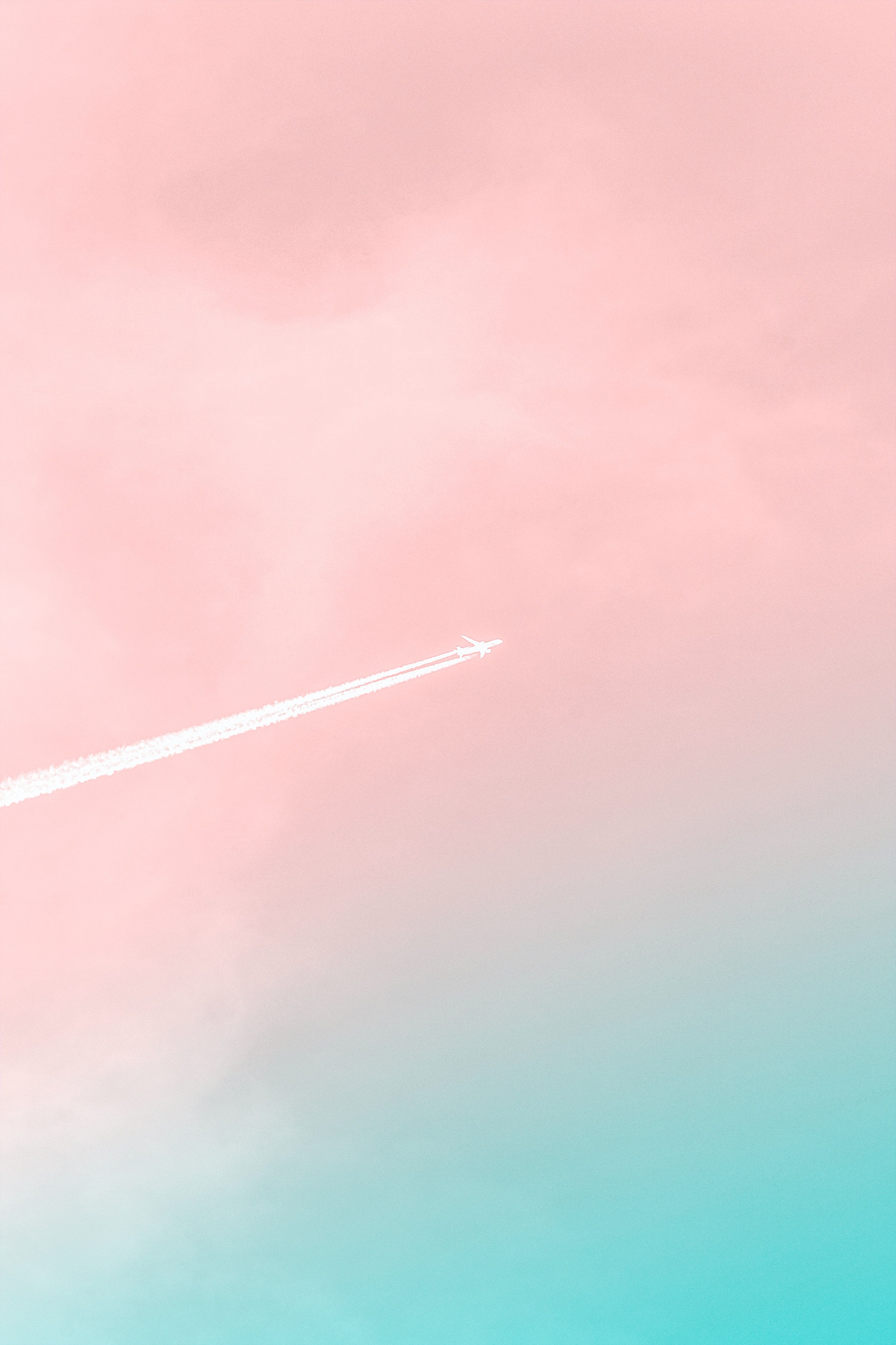 A plane flying through the sky with a white trail of smoke behind it - Pastel minimalist