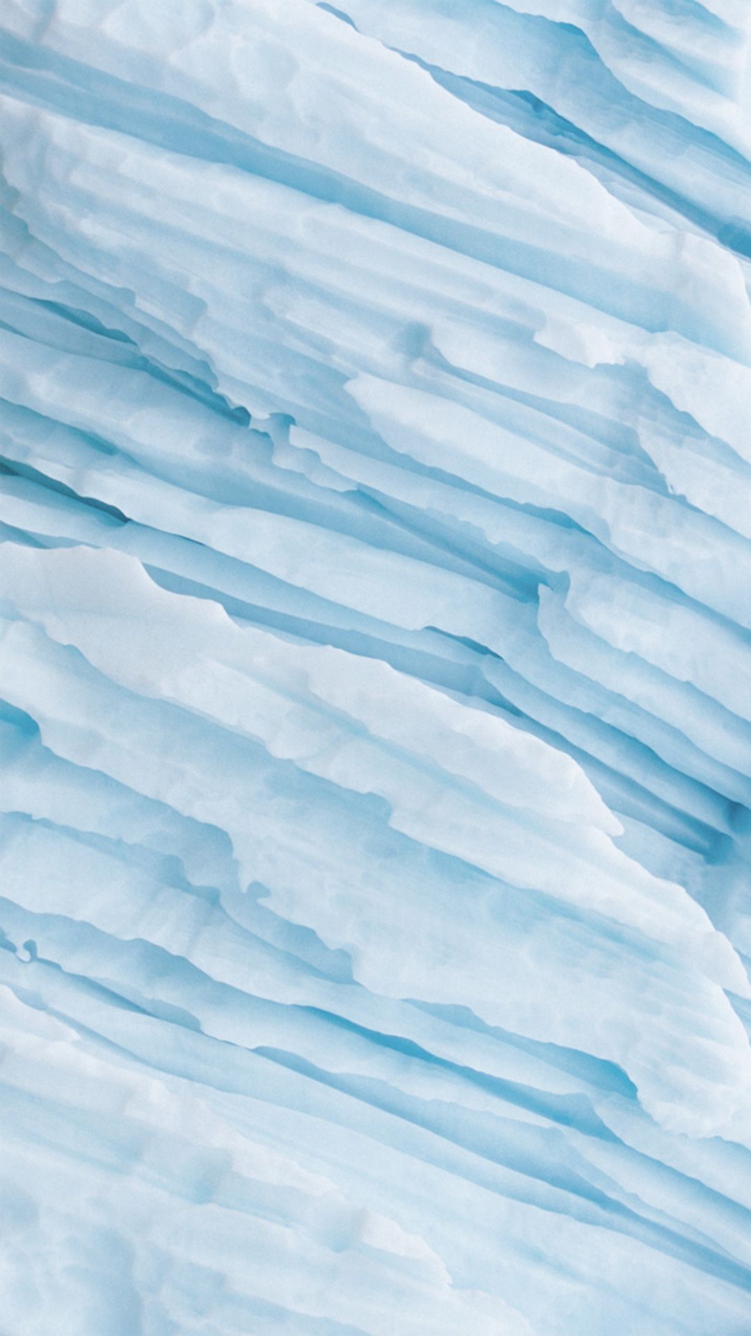 IPhone wallpaper with a close-up of ice formations. - Light blue