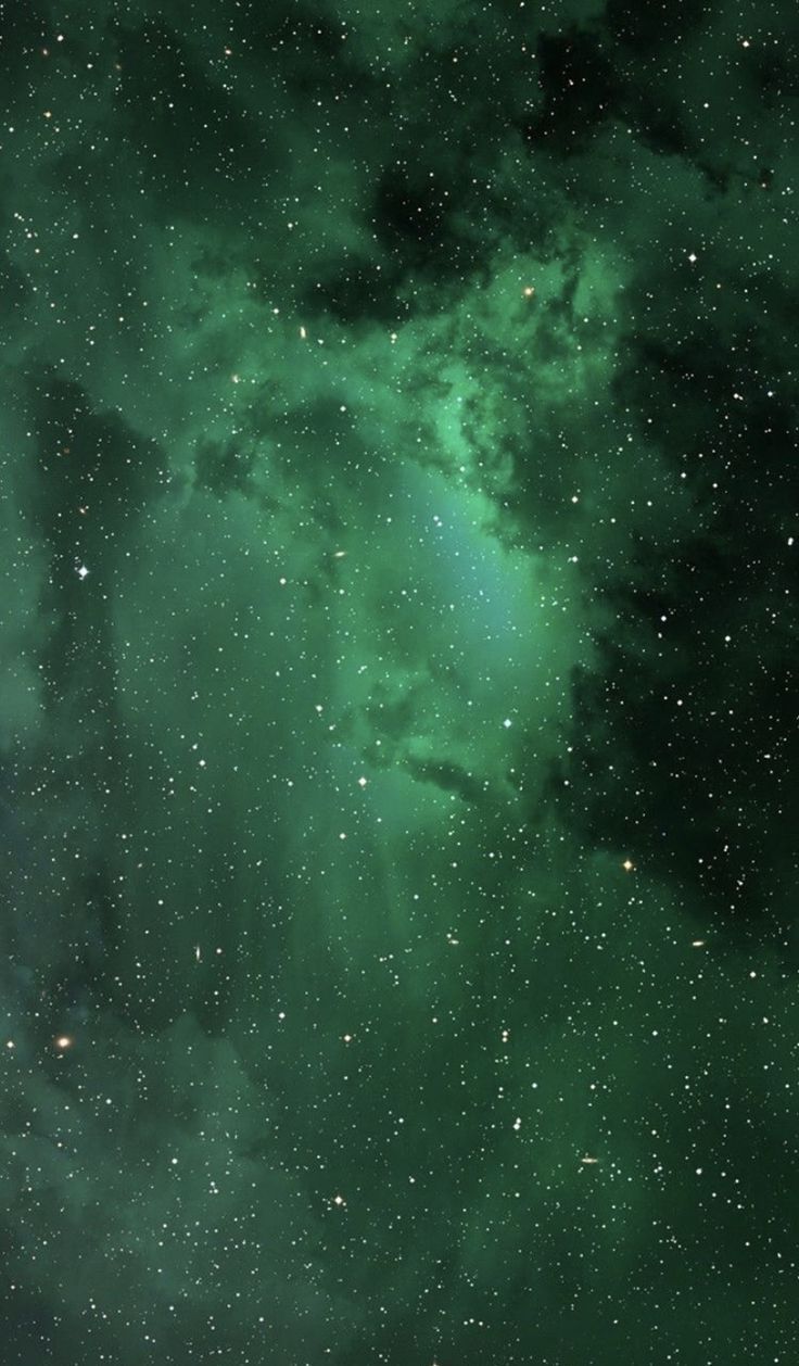 A green nebula with stars in the background - Dark green