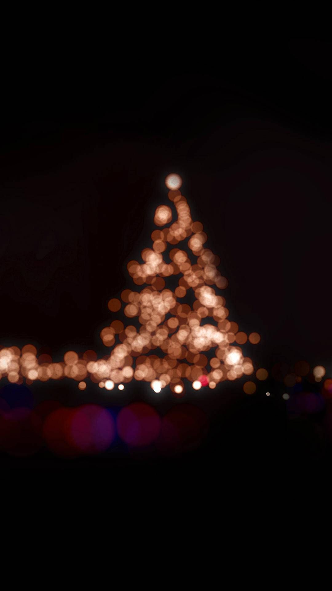A christmas tree with lights on it - Christmas iPhone, Christmas lights, Christmas