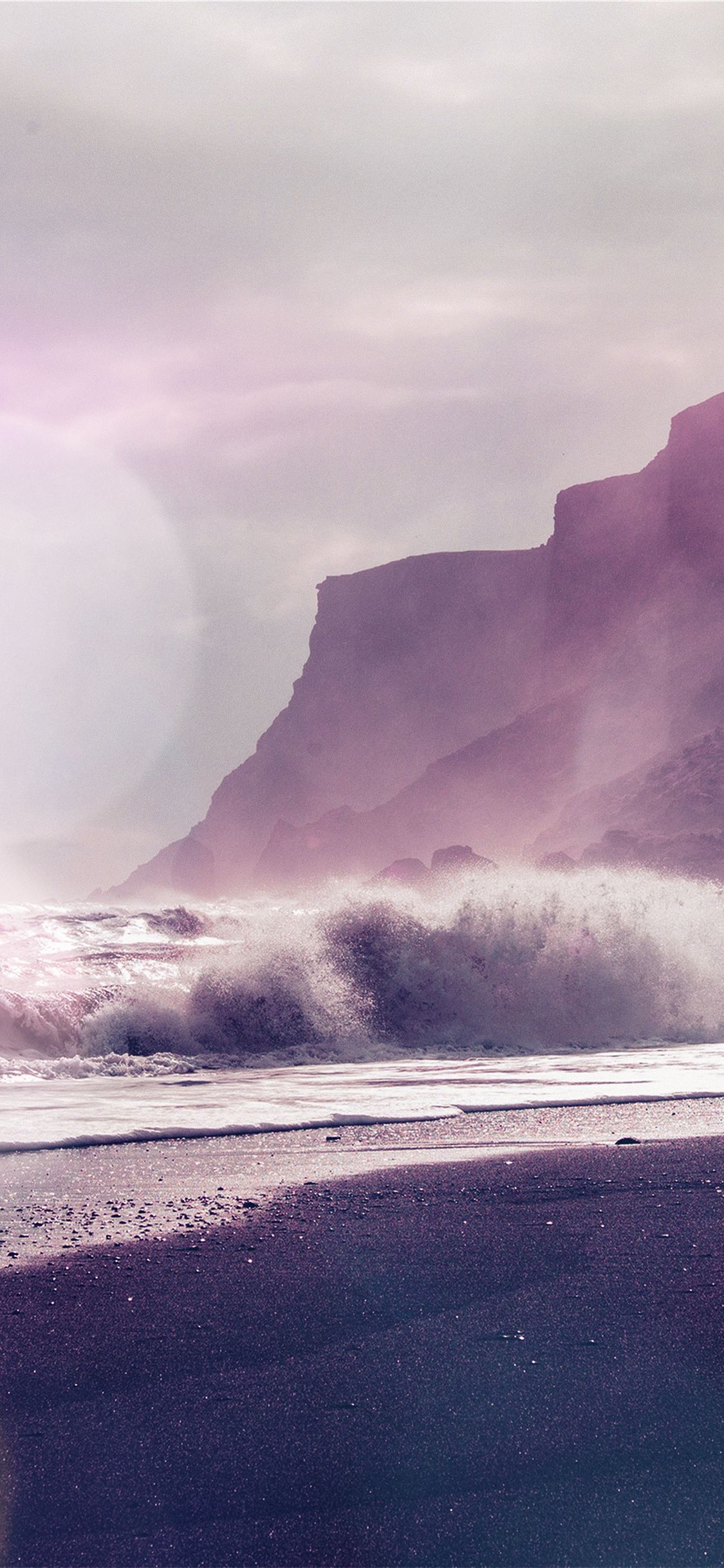 IPhone wallpaper of a cliff with waves crashing on the beach - Beach