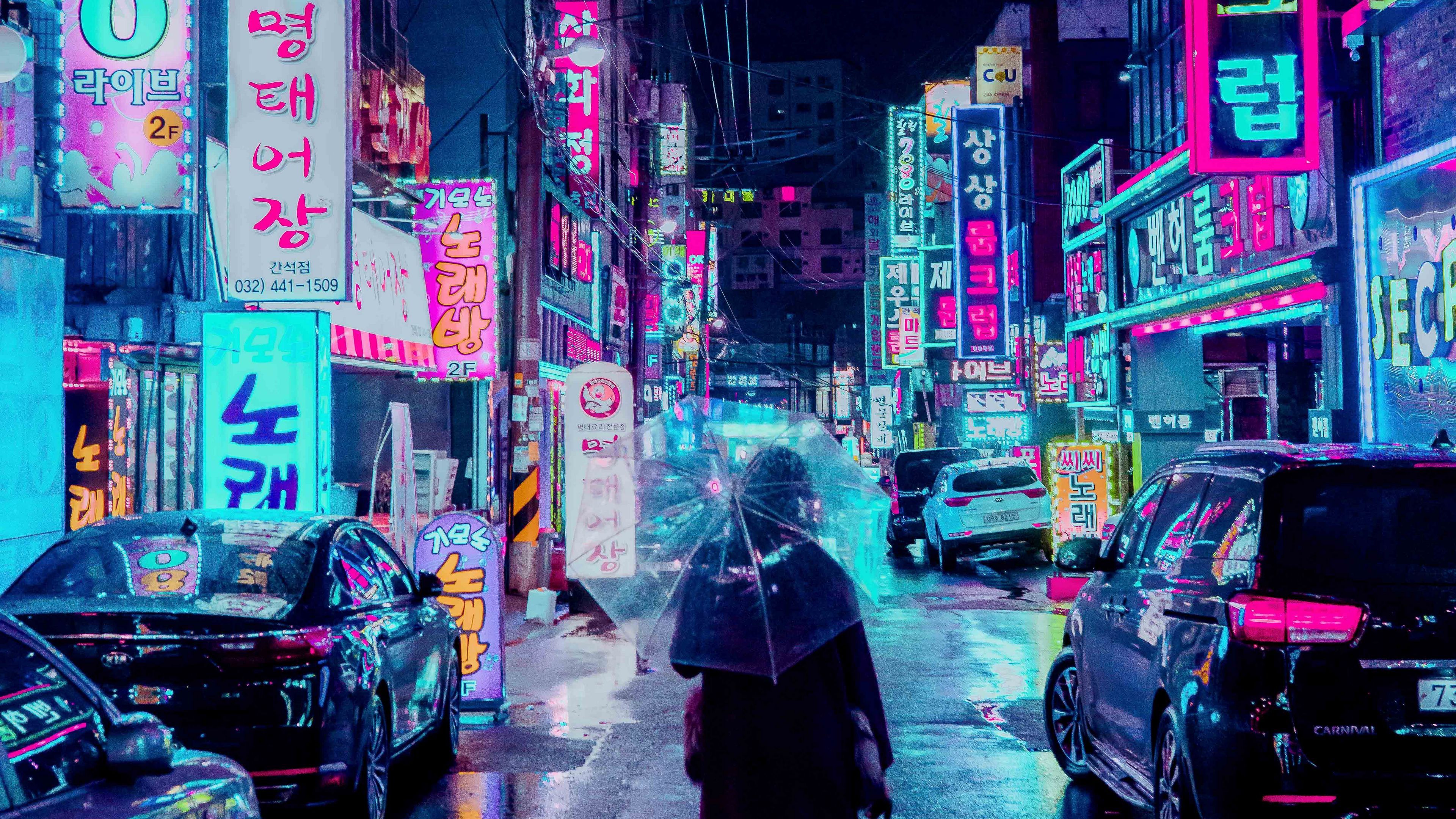 A woman walking down a neon-lit street in Seoul, South Korea - Cyberpunk, city, rain