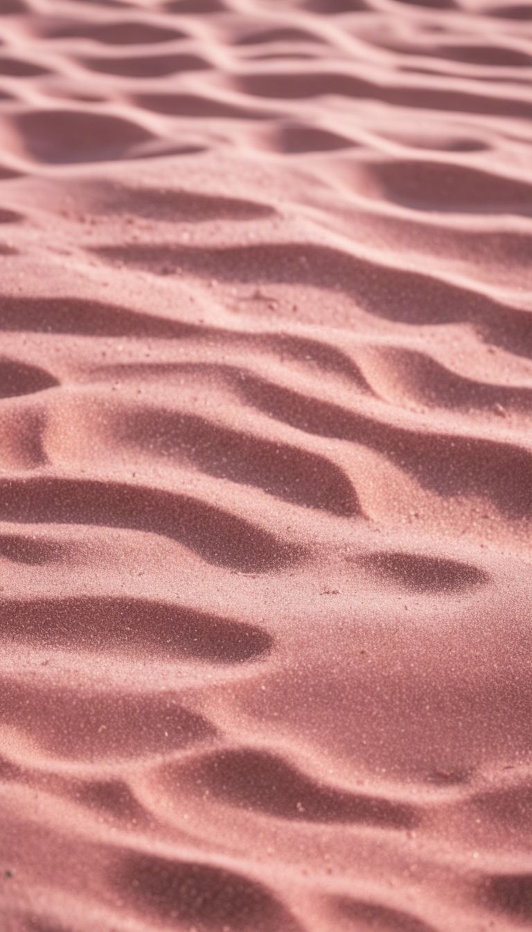 A detailed texture of a pink sand beach