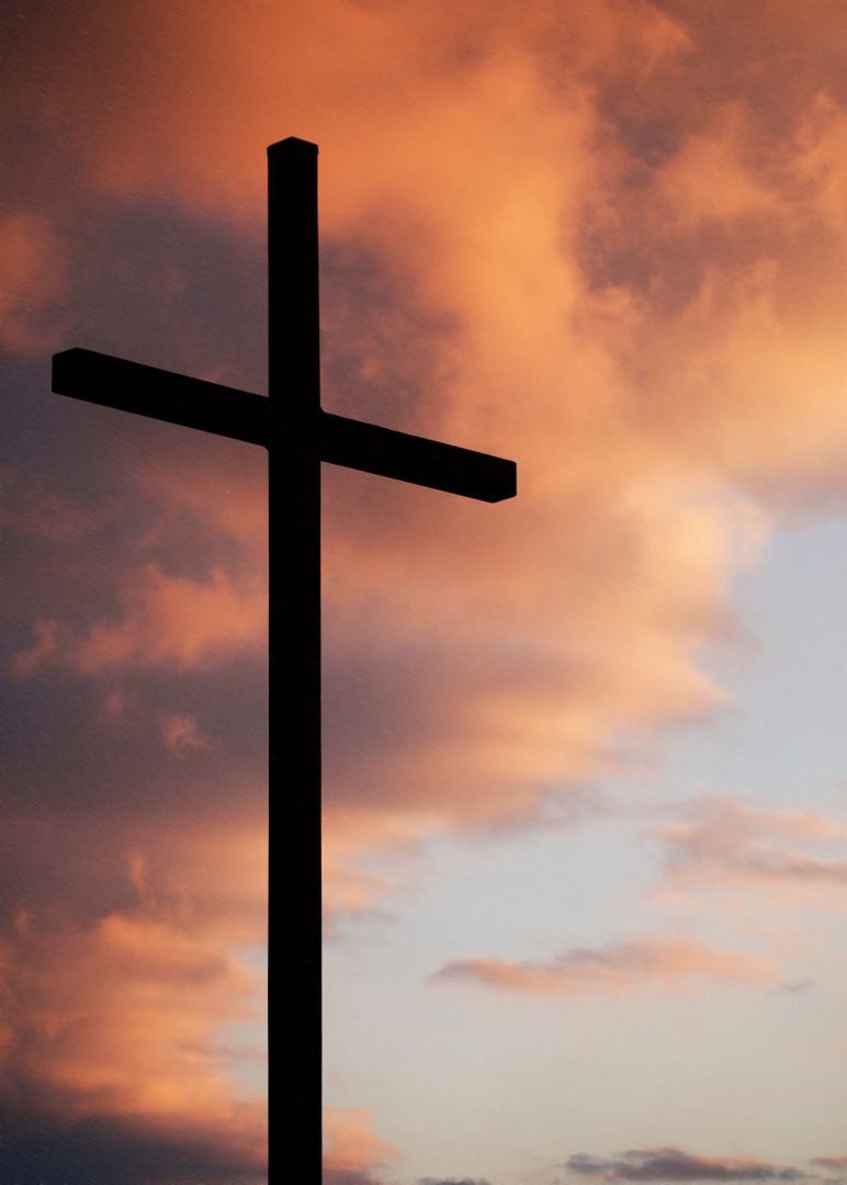 Cross at Sunset with Dramatic Sky