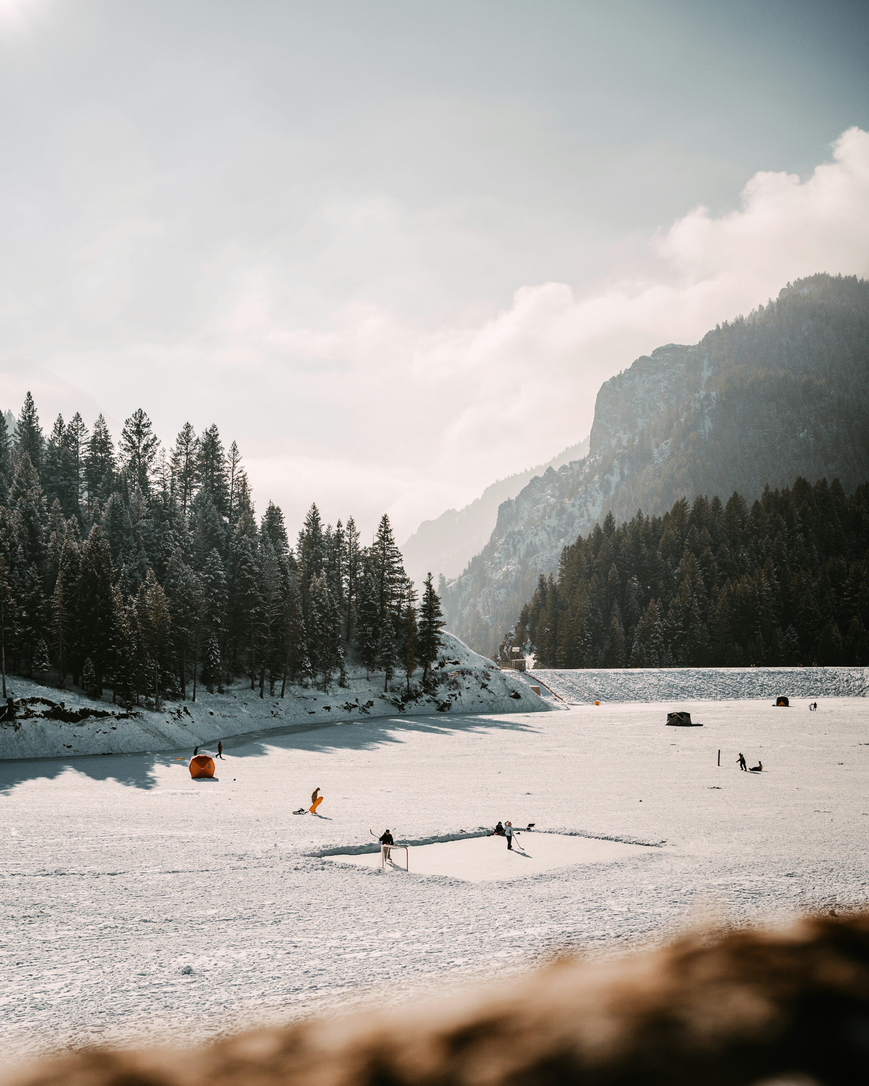 A group of people skiing across a snow