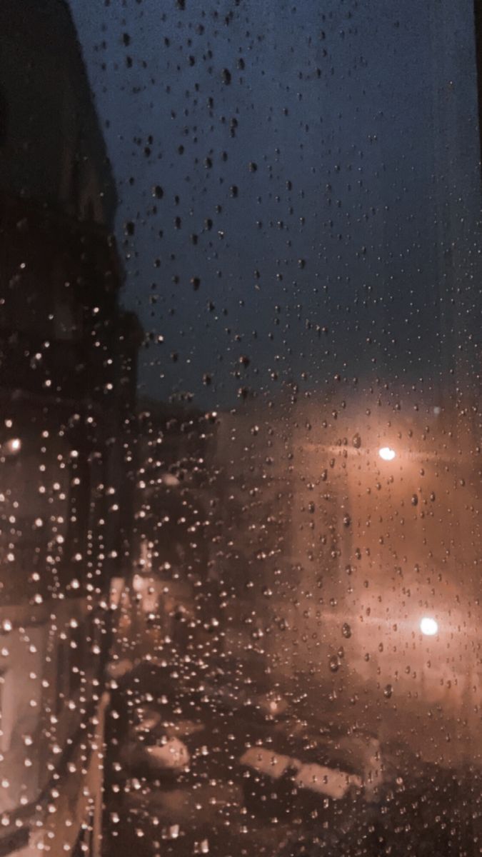 A window with rain on it at night - Rain