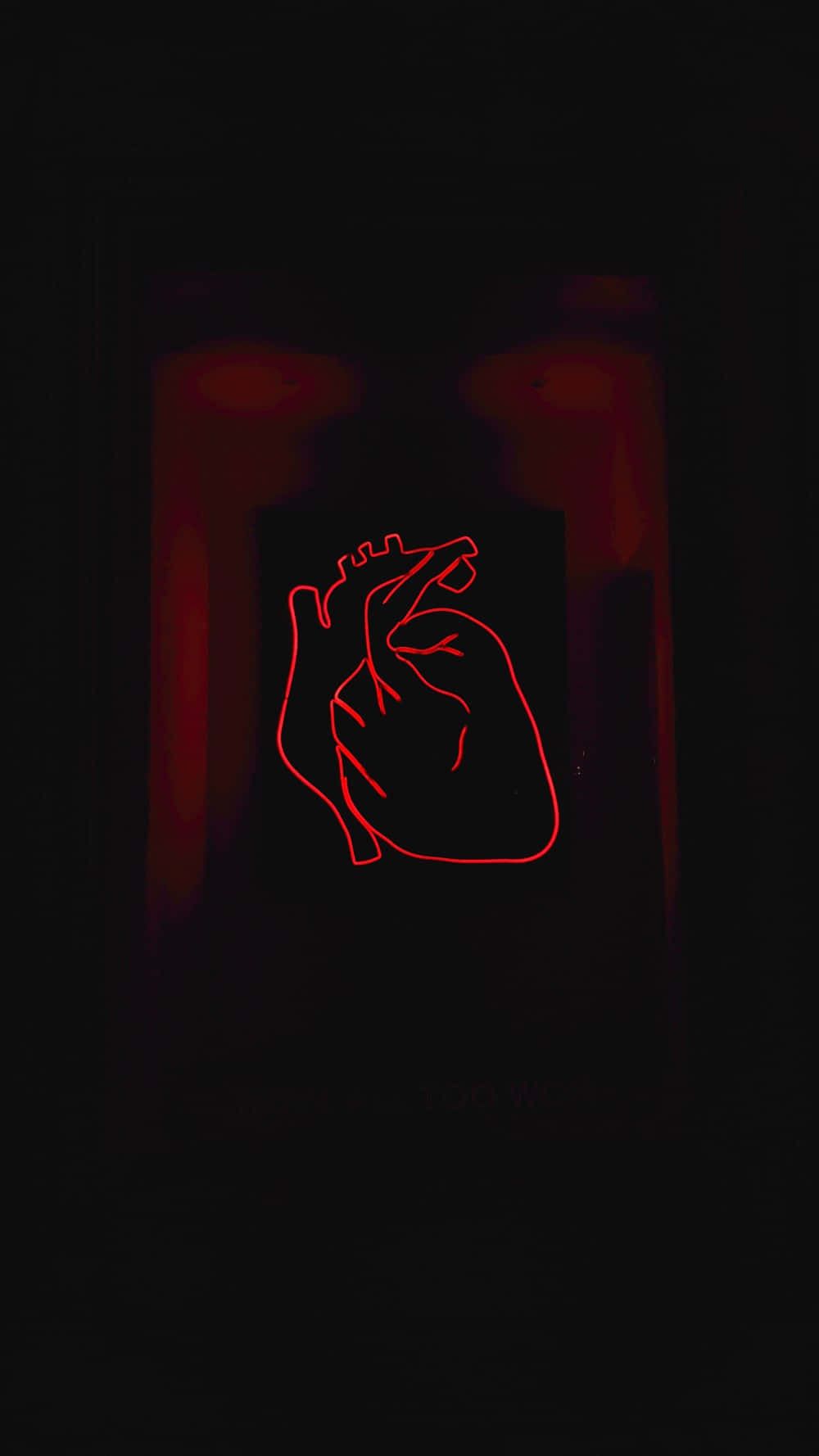 A red neon sign of a heart in a dark room. - Dark red
