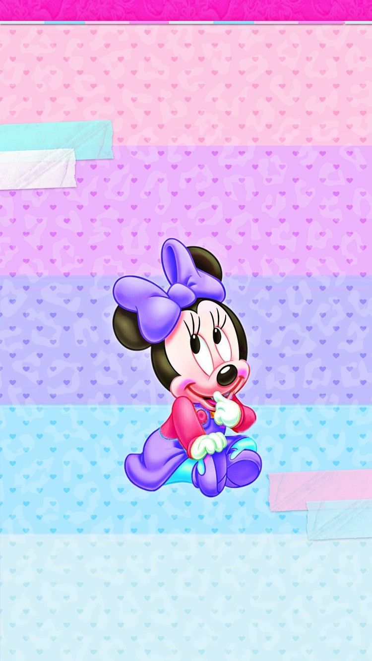 A cute little minnie mouse is holding her pink bow - Love, Disney