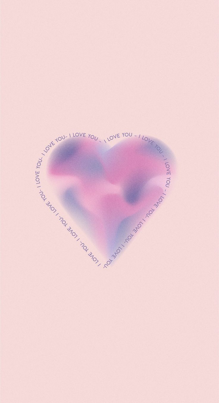 A pink heart with words on it - Love
