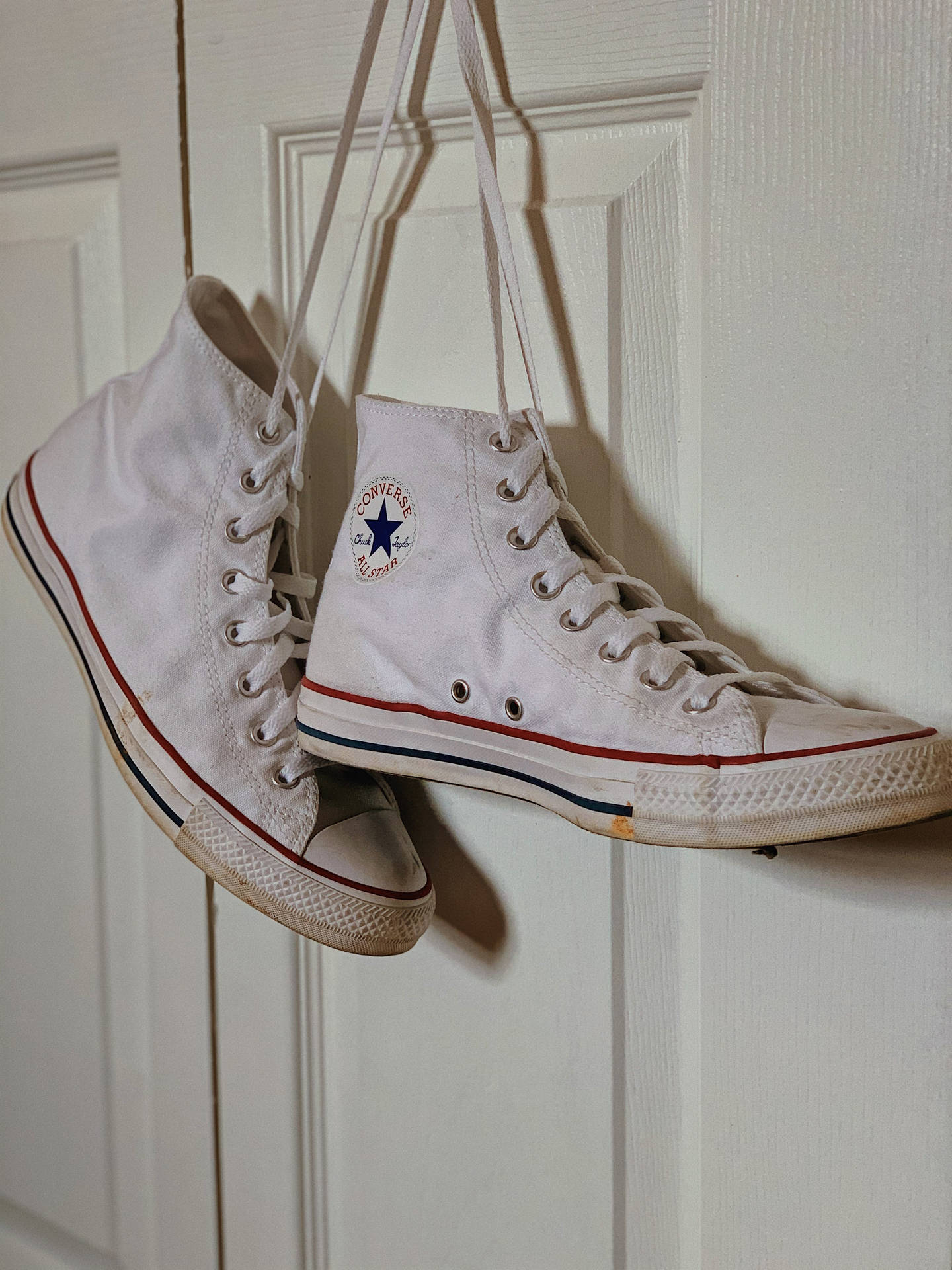 Hanging White Converse Wallpaper