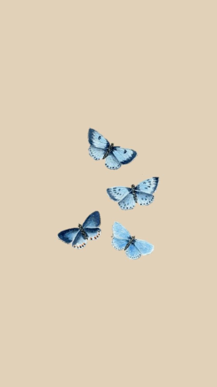 A group of blue butterflies on beige background - VSCO, Apple Watch