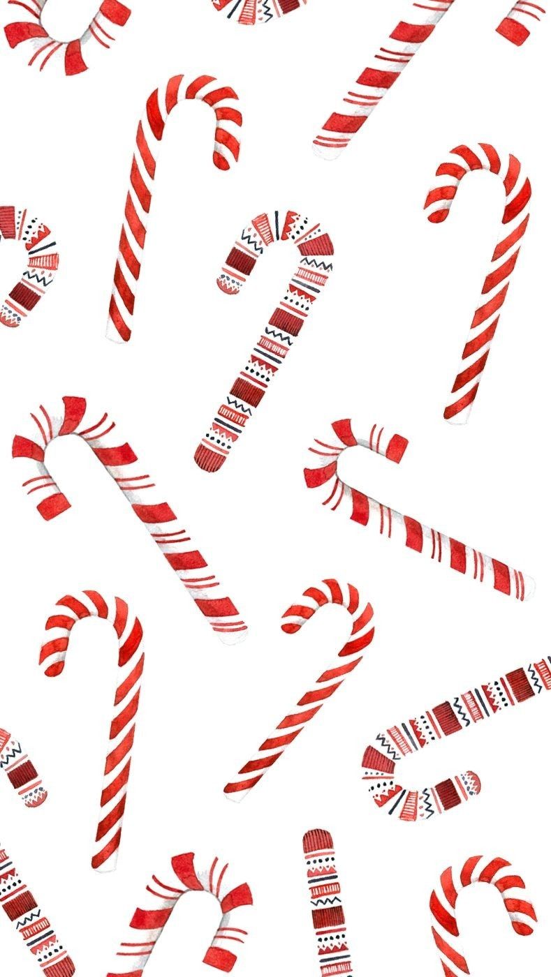 A pattern of candy canes in red and white on a white background - Candy cane