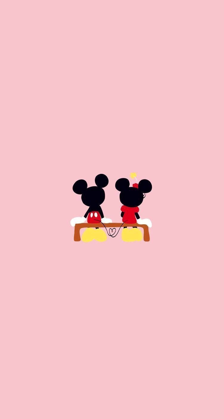 Mickey and minnie mouse on a pink background - Disney