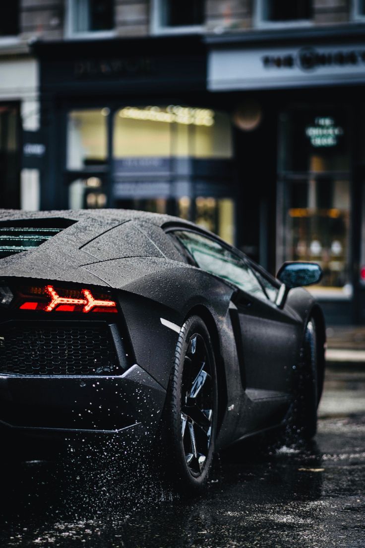 Black Aventador on the wet street. super car aesthetic wallpaper