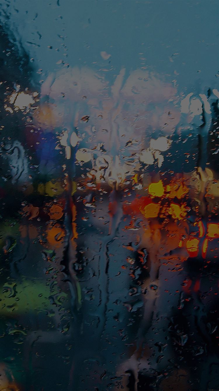 A car driving down the street in heavy rain - Rain