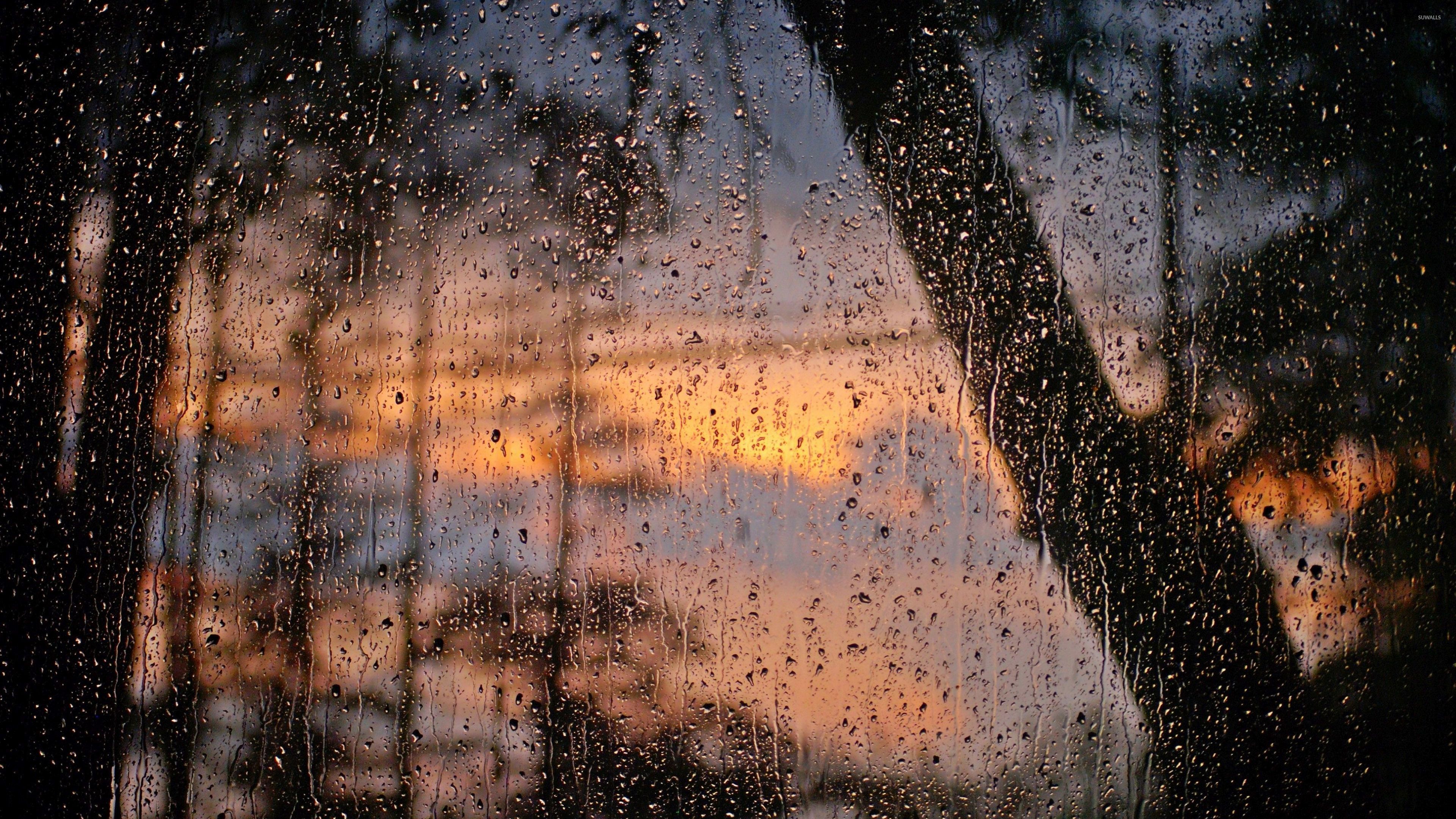 A window with rain drops on it - Rain