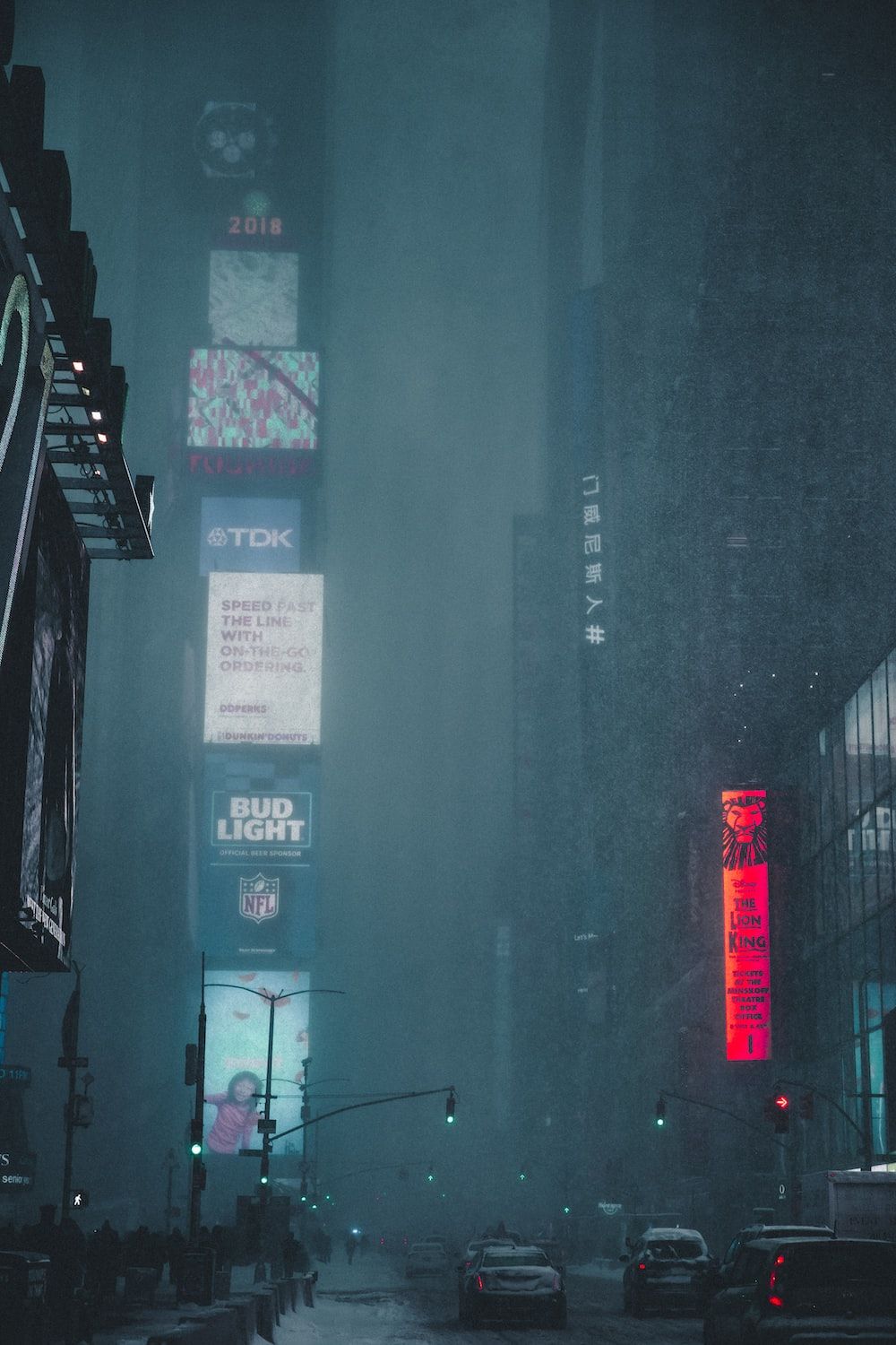 A snowy night in Times Square, New York City - Rain