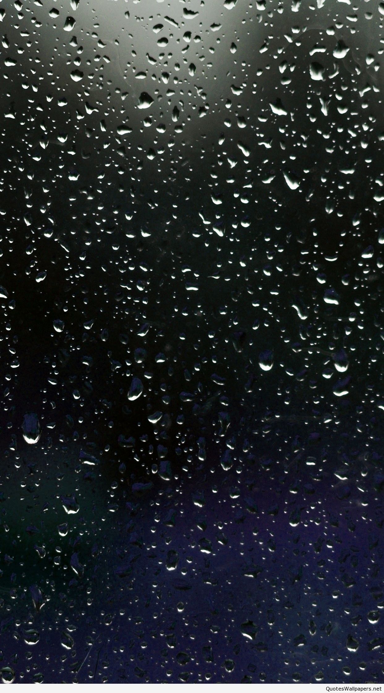 A window with raindrops on it and the sky - Rain